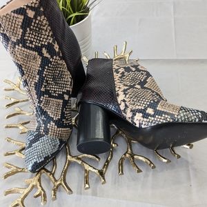 Nine West Booties, size 7.5, animal print, never used